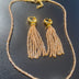 Crystal fringe necklace and earring set with 18k gold finish