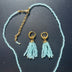 Crystal fringe necklace and earring set with 18k gold finish